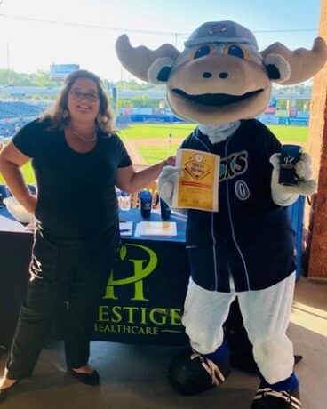 PRHC-woman and mascot for job fair